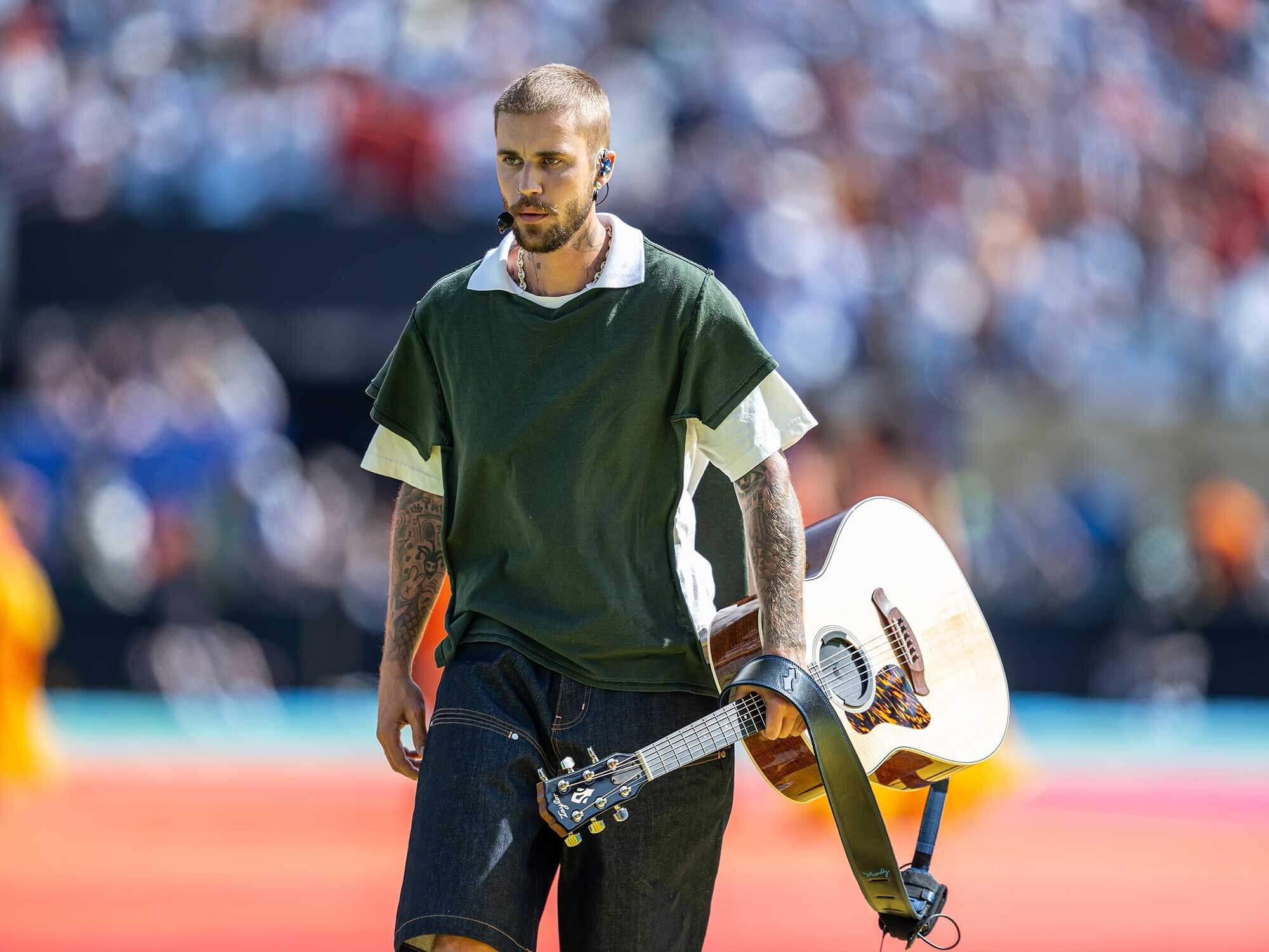 21-1784607672-justin-bieber-cai-nhau-nay-lua-voi-madonna-o-hau-truong-world-cup-2026